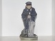 Royal 
Copenhagen 
figurine, 
shepherd with 
dog.
The factory 
mark tells, 
that this was 
produced ...