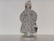 Rare and large 
Royal 
Copenhagen Art 
Nouveau 
figurine,  girl 
in fancy coat 
with umbrella 
and ...