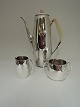 A F Rasmussen. 
Coffee service 
three parts. 
Consisting of 
coffeepot, 
creamer and 
sugar bowl. ...