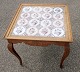 Coffee table in 
oak, rococo 
style with 
carvings and 16 
Dutch antique 
tiles, 19th / 
20th century. 
...