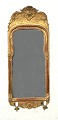 Mirror with 
original 
gilding and 
candle holder
Sweden around 
1750
Dimensions: 
101x42cm