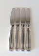Lotus dinner 
knife in silver 
and steel
Length 22 cm. 
Stamped 830s 
Stock: 2
