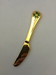 Georg Jensen 
Annual Knife 
1982 in gilded 
Sterling Silver 
with enamel. 
Measures 16 cm 
(6 19/64")