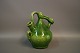 Ceramic in 
green glaze 
from the 1960s 
by an unknown 
ceramic artist.
H: 20 cm and 
W: 15 cm.