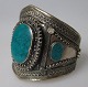 Afghan arm band, 20th century. Silver-plated metal. With decorations and malachite. H: 10 cm. ...