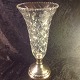 Trofee vase.
crystal vase 
Rude grindings 
and flower 
wreath at the 
edge.
the Three 
Tower silver 
...