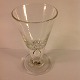 Masonic glass.
cone-shaped 
bowl,
hollow stem 
further to the 
bowl.
attached foot.
1800 ...