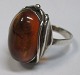 Silver ring 
with amber, 
Sterling, 20th 
century. 
Denmark. 
Stamped .: CF J 
925, Size: 54