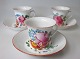 3 porcelain 
cups and 
saucers, 19th 
century. 
Hand-Painted 
with flowers. 
H: 6.8 cm. Dia 
saucer: ...