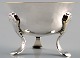 Danish silver 
salt cellar, 
small 
three-legged 
bowl.
Stamped "EK". 
Measures 6 x 5 
cm.
In good ...