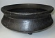 Black clay 
tripod pot, 
19th century. 
Denmark. 
Repaired. H .: 
13 cm. Dia .: 
29 cm.