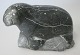 Inuit. soapstone figure, 20th century. Canada. A walrus. L .: 9 cm. H., 6 cm. Signed. With label ...