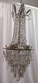 Large French 
crystal 
chandelier with 
glass prisms 
and crystal 
prisms, 19th 
century. With 
bronze ...