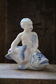 Very rare blue 
fluted figure 
of boy sitting 
on the fish 
from Royal 
Copenhagen. ( 
1920-23 ...