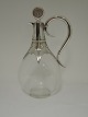 Decanter with 
silver 
mounting. 
Cardeilhac 
Paris. Height 
26 cm.