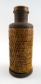 Kähler, 
Denmark, glazed 
stoneware vase. 
Nils Kähler. 
1960s.
Brown and dark 
yellow glaze.
In ...