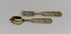 A. Michelsen 
Christmas spoon 
& fork in 
gilded sterling 
silver and 
enamel from 
1939 
Stamp: A. ...