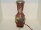 Most likely 
Kongstrand art 
pottery table 
lamp  with 
pewter mounting 
by Mogens 
Ballin.
This is ...