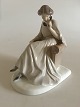 Bing & Grondahl 
Figurine of 
Sitting woman 
with phone No 
1706. 
Designed by 
Axel ...