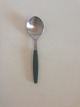 Georg Jensen 
Stainless Green 
Strata Dinner 
Spoon. Measures 
17.3 cm / 6 
13/16 in.