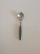 Georg Jensen 
Stainless Green 
Strata Coffee 
Spoon. Measures 
13.8 cm / 5 
7/16 in.
