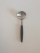 Georg Jensen 
Stainless Black 
Strata Bouillon 
Spoon. Measures 
15.8 cm / 6 
7/32 in.