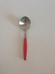 Georg Jensen 
Stainless Red 
Strata Dinner 
Spoon. Measures 
17.1 cm / 6 
47/64 in.