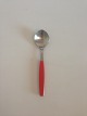Georg Jensen 
Stainless Red 
Strata Dessert 
Spoon. Measures 
16.5 cm / 6 1/2 
in.