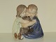 Royal 
Copenhagen 
Figurine, Boy, 
girl and 
dachshund.
The factory 
mark tells, 
that this was 
...