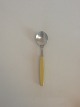Georg Jensen 
Stainless 
'Strata, 
Yellow' Dessert 
Spoon. Measures 
16.5 cm / 6 1/2 
in.