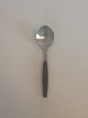 Georg Jensen 
Stainless 
'Strata, Brown' 
Dinner Spoon. 
Measures 17.1 
cm / 6 47/64 
in.