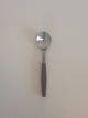 Georg Jensen 
Stainless 
'Strata, Brown' 
Coffee Spoon. 
Measures 13.7 
cm / 5 25/64 
in.