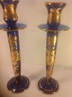pair of 
mouth-blown 
glass 
candlesticks 
with gold 
decoration.
Height: 30 cm.
beautiful and 
well ...