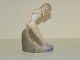 Royal 
Copenhagen 
Figurine, girl 
bathing.
The factory 
mark tells, 
that this was 
produced ...