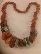 Amber necklace 
with 
turquoises.
Length: 65 cm.
weight of 83 
grams.
switch
Telephone 0045 
...