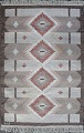 Rölakan carpet with geometric pattern in brown / red hues.Signed MJ.Sweden, mid 20 c.L. ...