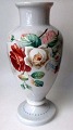 Large opaline 
vase, grayish 
glass mass, 
19th century. 
With enamel 
liveries in the 
form of ...