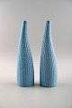 Gustavsberg, 
Sweden, a pair 
of reptile 
vases in 
turquoise by 
Stig Lindberg, 
Swedish ...