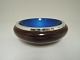 David Andersen. 
Sterling (925). 
Ashtray with 
blue enamel. 
The bottom is 
made of wood. 
Diameter ...
