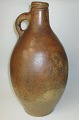 German 
stoneware 
bottle, 19th 
century. With 
salt glaze. 
Stamped with 
the stars at 
the spout. H 
...