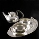 Georg Jensen. 
Sterling Silver 
Tea Set #1051.
Teapot, 
Creamer, Sugar 
Bowl and Tray.
Teapot ...
