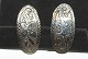 Earrings 
Sterling silver 
Clips
Stamp: 925, 
Karakus
Size 34 x 17 
mm.
well 
maintained ...