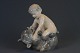 Porcelain 
Figure: Royal 
Copenhagen, 
Faun with bear, 
h: 19 cm