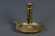 Candlestick in 
brass with 
handle, h: 12 
cm