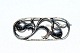 Brooch Silver
Stamp: A.RING, 
830
Size 3.8 x 1.6 
cm.
Used but well 
maintained.
Click ...