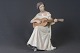 Porcelain 
Figure: Bing & 
Grondahl, Girl 
with guitar, h: 
24 cm