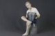 Porcelain 
Figure: Bing & 
Grondahl, Boy 
with accordion, 
h: 23 cm