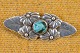 Brooch with 
flowers in 
silver and core 
of turquoise 
ceramics. Art 
Nouveau 
inspired. 
Stamped ARK ...