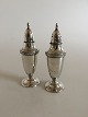 A Set of Two 
Shakers / 
Casters in 
Sterling 
Silver. 14.5 cm 
tall (5 
45/64"). 
Combined weight 
is ...