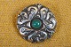 Broche Art 
Nouveau silver 
closed back, 
decorated with 
green agate. 
Stamped 830S 
"ECW". Diameter 
...